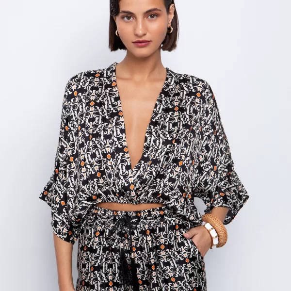 Εμπριμέ μπλούζα με ανοιχτό-V - ΕΜΠΡΙΜΕ