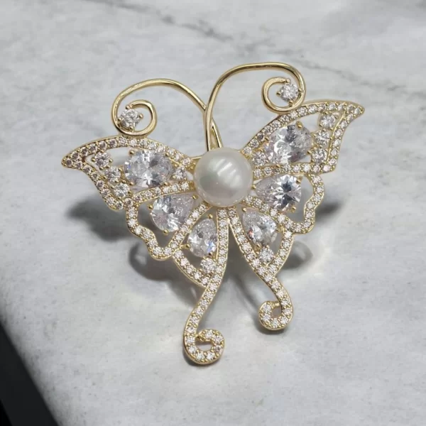 ΚΑΡΦΙΤΣΑ ΧΡΥΣΟ ΠΕΤΑΛΟΥΔΑ ΑΠΌ ΖΙΡΓΚΟΝ ΚΑΙ ΣΤΡΑΣ ΜΕ ΠΕΡΛΑ ΣΤΟ ΚΕΝΤΡΟ